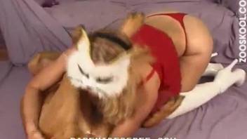 Blonde stunner tasting a dog's cock in a hot vid