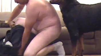 Older dude with a phat butt gets fucked by a dog